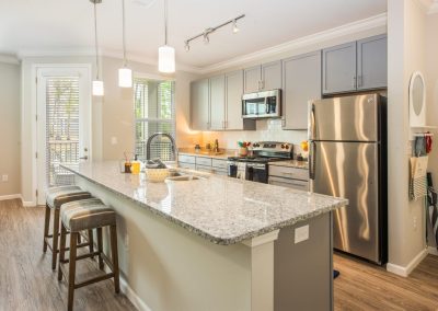 Acadia Light Gray Cabinets Finished Kitchen and Island Marbled Counter Tops