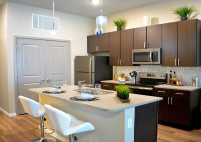 TFL Teak Cabinets Finished Kitchen White Counter Tops